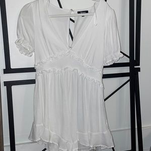 Francesca’s white romper